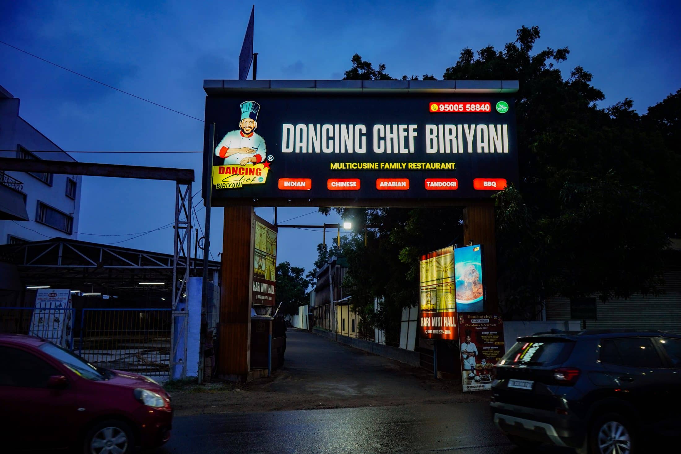 The restaurant and its lit signage at dusk — Dancing Chef Biriyani, Coimbatore (9)